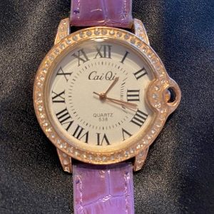 Cai Qi Ross gold watch